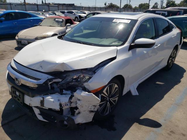 Photo 2 from auction – 2018 HONDA CIVIC EX with VIN JHMFC1F34JX015536