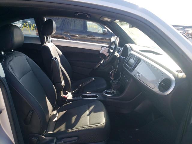 Photo 5 from auction – 2014 VOLKSWAGEN BEETLE with VIN 3VWJP7AT1EM614753