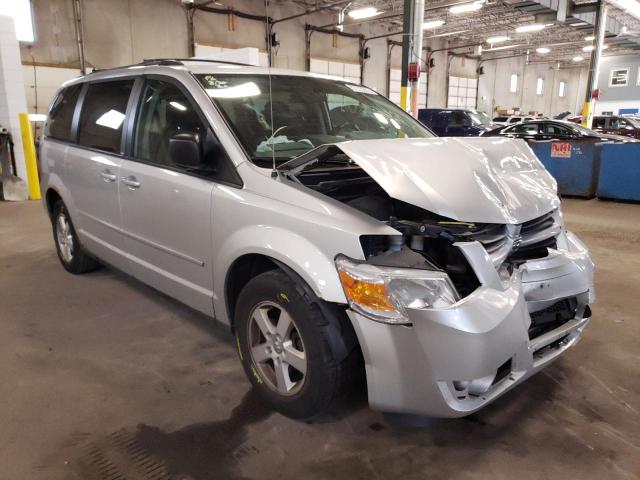 DODGE GRAND CARA 2010 with VIN 2D4RN3D14AR477022 - Photo from auction