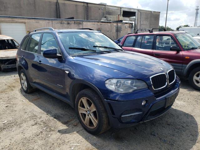 BMW X5 2012 with VIN 5UXZV4C56CL988409 - Photo from auction