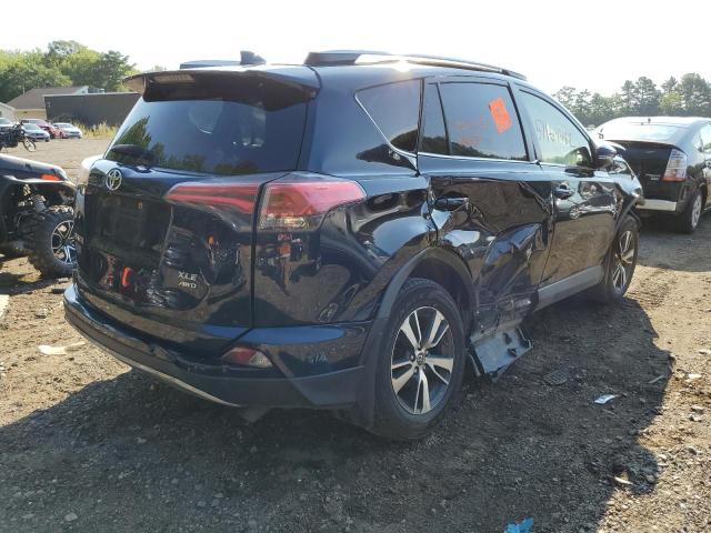 Photo 4 from auction – 2017 TOYOTA RAV4 XLE with VIN JTMRFREV2HD202647
