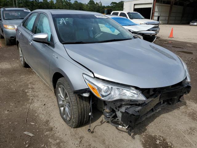 TOYOTA CAMRY HYBR 2015 with VIN 4T1BD1FK4FU168216 - Photo from auction