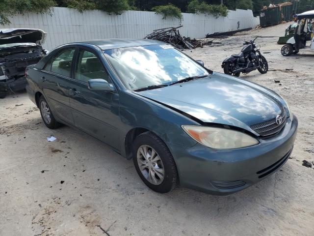 TOYOTA CAMRY LE 2004 with VIN 4T1BF32K84U075658 - Photo from auction