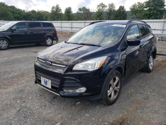 Photo 2 from auction – 2016 FORD ESCAPE SE with VIN 1FMCU9GX7GUC17682