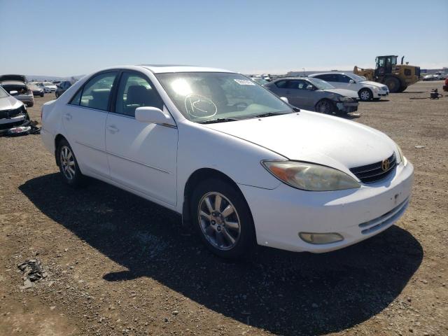 TOYOTA CAMRY LE 2002 with VIN JTDBF30K320003648 - Photo from auction
