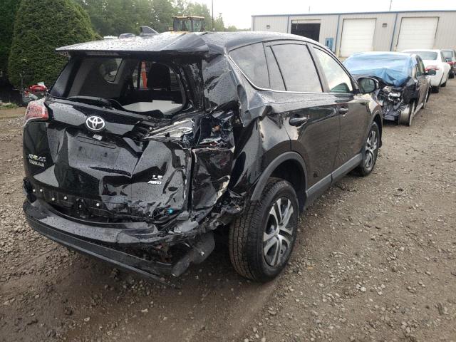 Photo 4 from auction – 2018 TOYOTA RAV4 LE with VIN 2T3BFREV7JW812909
