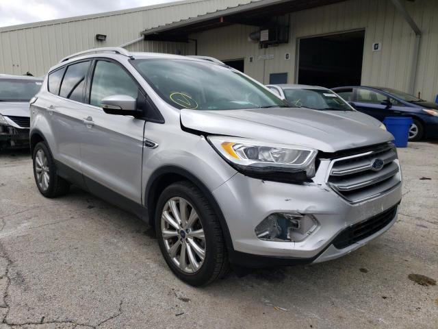 FORD ESCAPE TIT 2017 with VIN 1FMCU0J93HUA64676 - Photo from auction
