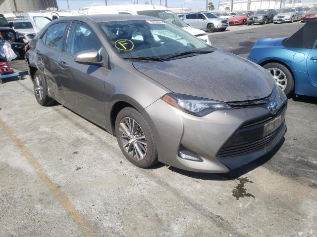TOYOTA COROLLA L 2017 with VIN 5YFBURHE0HP637537 - Photo from auction