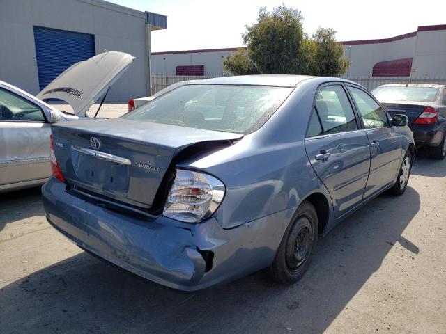 Photo 4 from auction – 2002 TOYOTA CAMRY LE with VIN JTDBE32K420033127