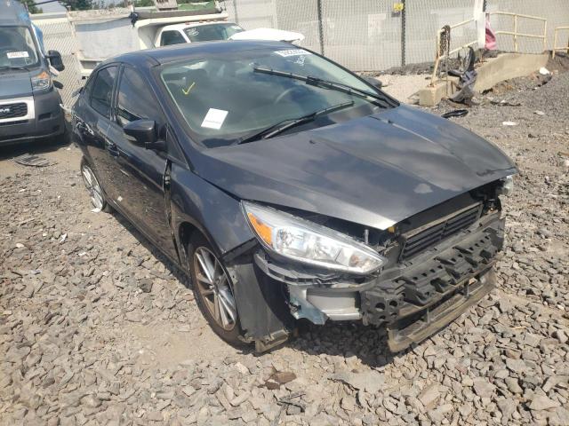 FORD FOCUS SE 2017 with VIN 1FADP3F24HL293778 - Photo from auction
