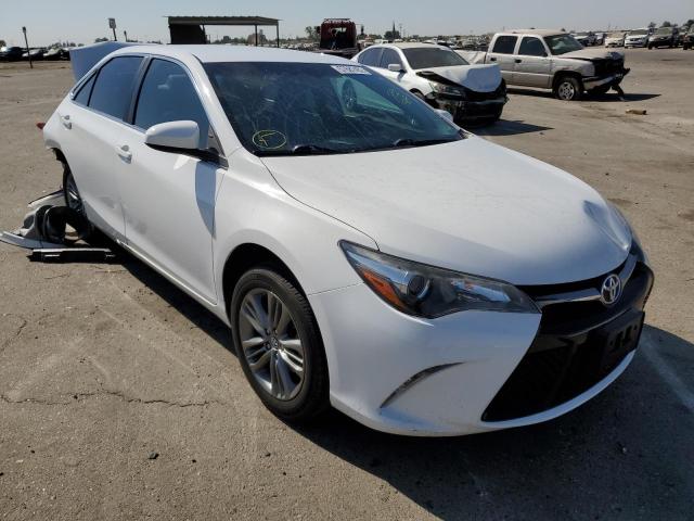 TOYOTA CAMRY LE 2017 with VIN 4T1BF1FK7HU720711 - Photo from auction
