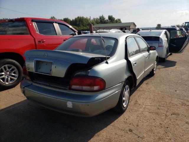 Photo 4 from auction – 1999 MAZDA 626 ES with VIN 1YVGF22C3X5847702