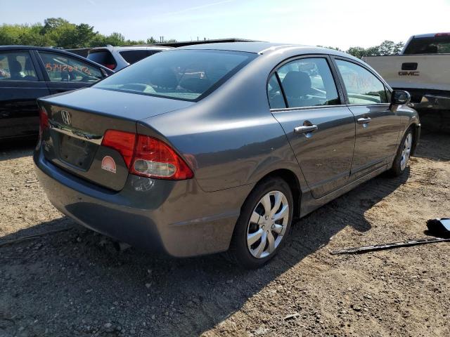 Photo 4 from auction – 2011 HONDA CIVIC LX with VIN 19XFA1F59BE050177