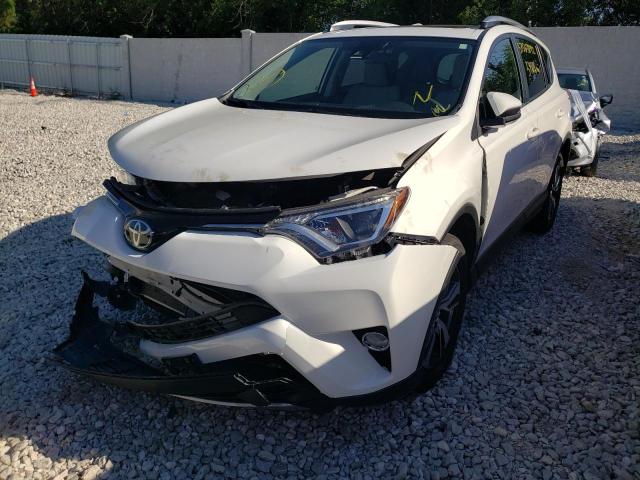 Photo 2 from auction – 2017 TOYOTA RAV4 XLE with VIN JTMRFREV8HJ705066