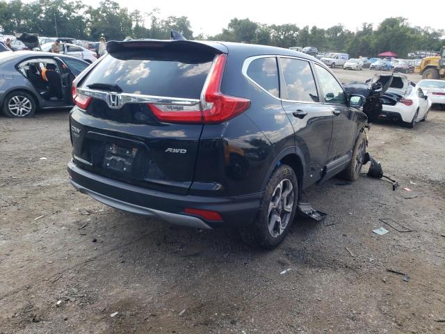 Photo 4 from auction – 2018 HONDA CR-V EX with VIN 7FARW2H53JE047385