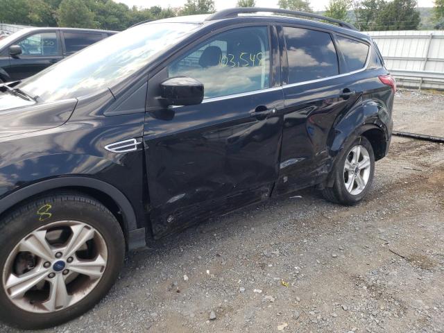 Photo 9 from auction – 2016 FORD ESCAPE SE with VIN 1FMCU9GX7GUC17682