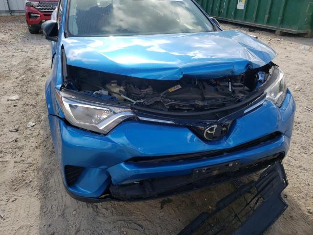 Photo 9 from auction – 2018 TOYOTA RAV4 LE with VIN JTMBFREV6JJ721743