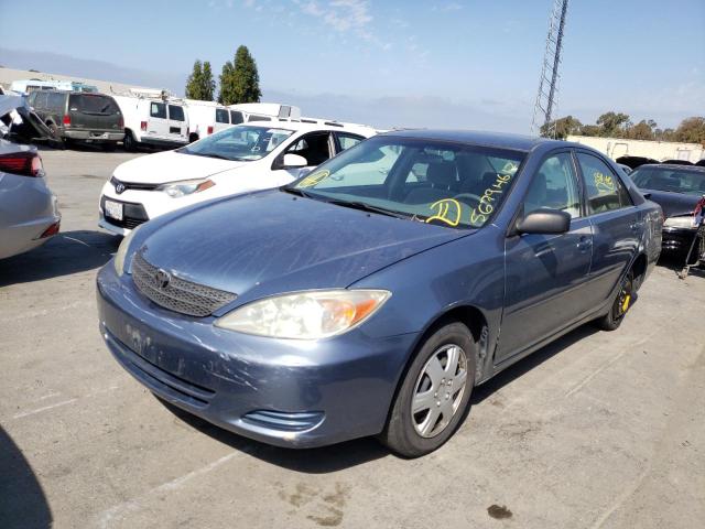 Photo 2 from auction – 2002 TOYOTA CAMRY LE with VIN JTDBE32K420033127