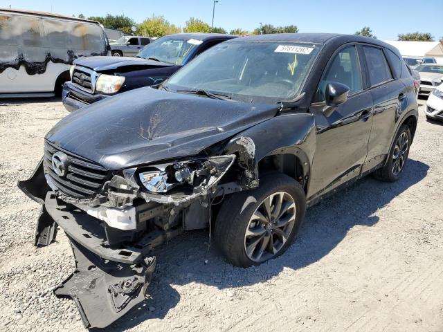 Photo 2 from auction – 2016 MAZDA CX-5 GT with VIN JM3KE4DY5G0793492