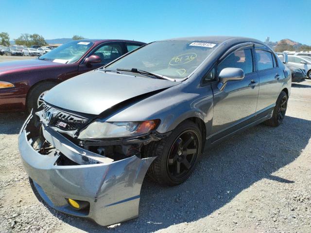 Photo 2 from auction – 2011 HONDA CIVIC LX with VIN 19XFA1F52BE043569