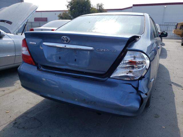 Photo 9 from auction – 2002 TOYOTA CAMRY LE with VIN JTDBE32K420033127