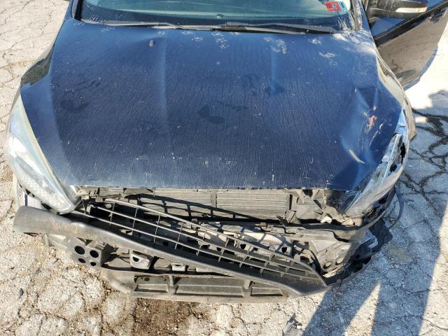 Foto 7 de la subasta – 2015 FORD FOCUS SE con VIN 1FADP3K24FL313059