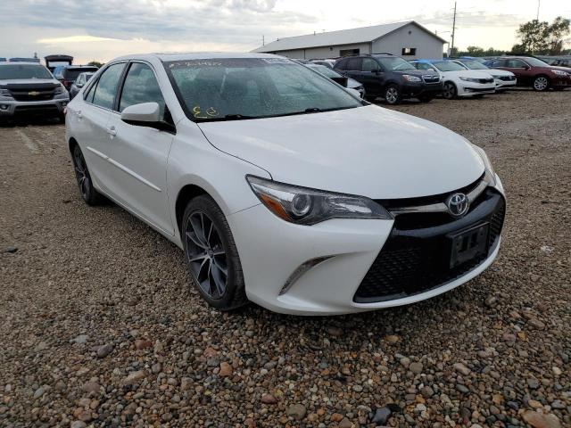 TOYOTA CAMRY LE 2015 with VIN 4T1BF1FK3FU874586 - Photo from auction