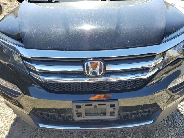 Photo 7 from auction – 2017 HONDA PILOT ELIT with VIN 5FNYF6H09HB034542