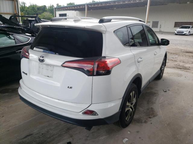 Photo 4 from auction – 2017 TOYOTA RAV4 LE with VIN 2T3ZFREV1HW324984