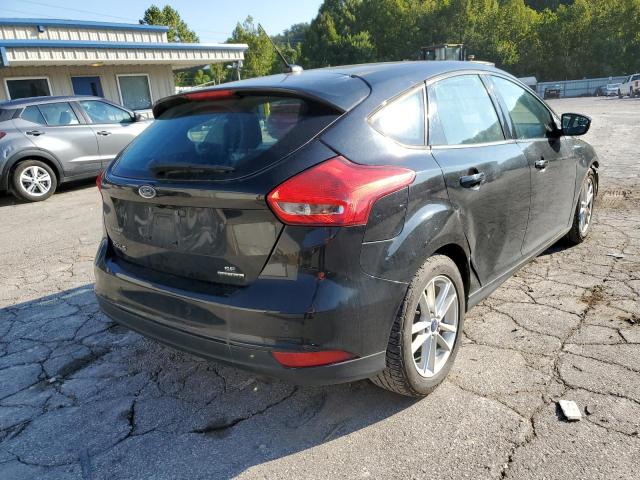 Foto 4 de la subasta – 2015 FORD FOCUS SE con VIN 1FADP3K24FL313059