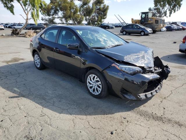TOYOTA COROLLA L 2019 with VIN 5YFBURHE9KP942056 - Photo from auction