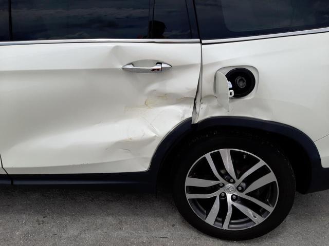Photo 9 from auction – 2018 HONDA PILOT TOUR with VIN 5FNYF6H95JB042786