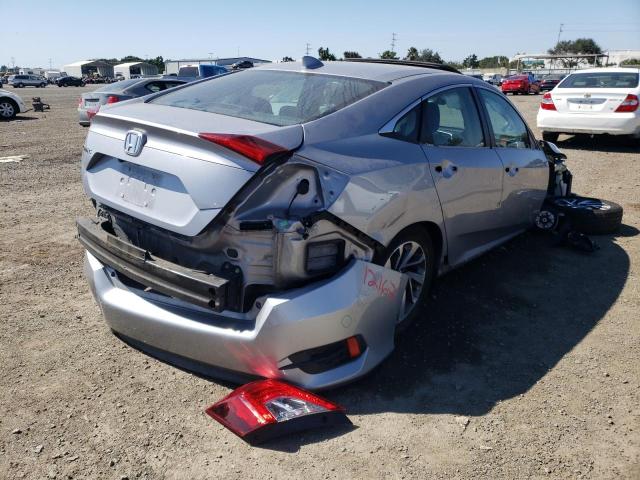 Photo 4 from auction – 2018 HONDA CIVIC EX with VIN 2HGFC2F76JH515276