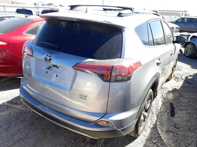 Photo 4 from auction – 2017 TOYOTA RAV4 XLE with VIN 2T3RFREVXHW566365