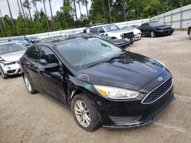 FORD FOCUS SE 2018 with VIN 1FADP3F2XJL319466 - Photo from auction