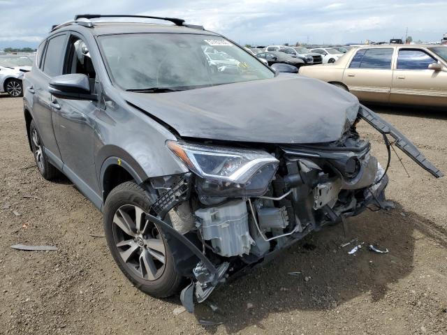 TOYOTA RAV4 ADVEN 2018 with VIN 2T3RFREV9JW752002 - Photo from auction