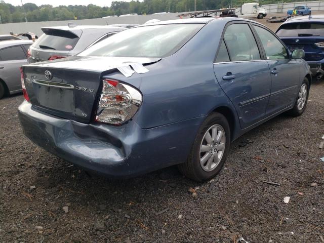 Photo 4 from auction – 2002 TOYOTA CAMRY LE with VIN JTDBF30K420056388