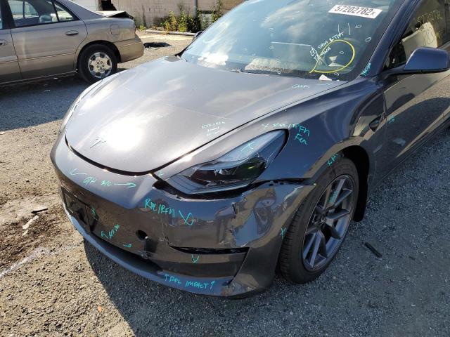 Photo 9 from auction – 2021 TESLA MODEL 3 with VIN 5YJ3E1EA3MF043406
