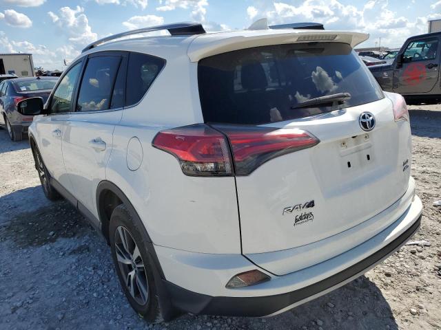 Photo 3 from auction – 2017 TOYOTA RAV4 XLE with VIN JTMRFREV5HJ112832