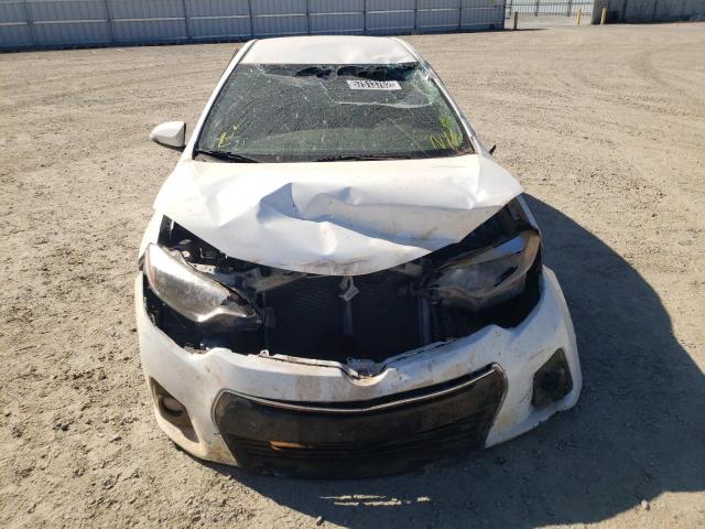 Photo 9 from auction – 2014 TOYOTA COROLLA L with VIN 5YFBURHE7EP101342