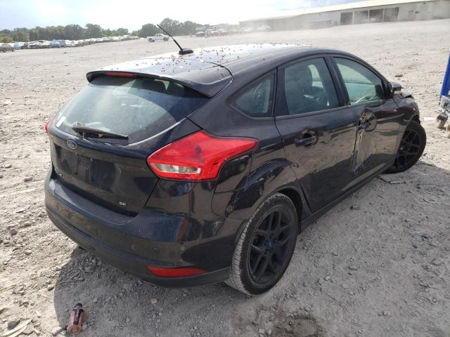 Photo 4 from auction – 2016 FORD FOCUS SE with VIN 1FADP3K22GL323462