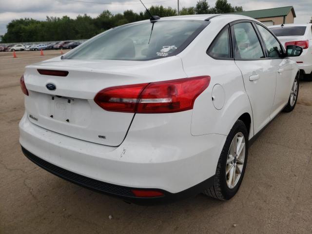 Photo 4 from auction – 2017 FORD FOCUS SE with VIN 1FADP3F22HL213670