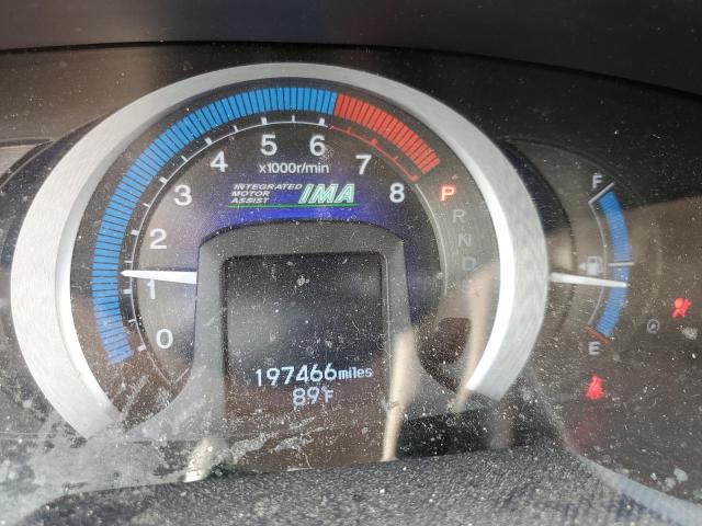 Photo 8 from auction – 2010 HONDA INSIGHT EX with VIN JHMZE2H74AS023744