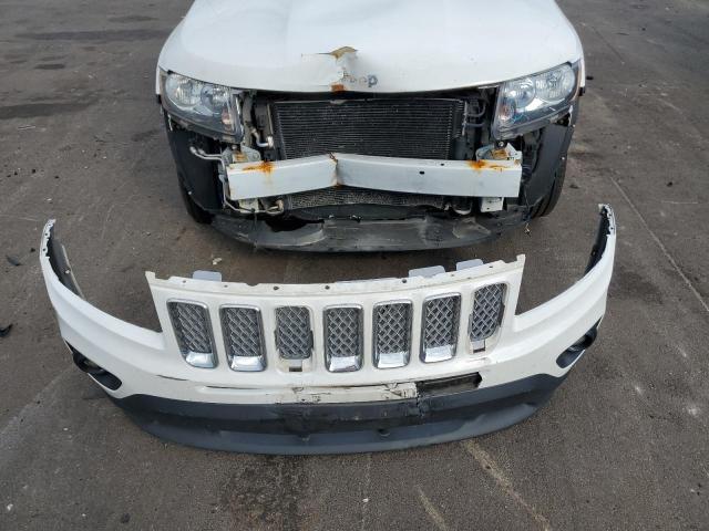 Photo 9 from auction – 2014 JEEP COMPASS LA with VIN 1C4NJDEB4ED659106