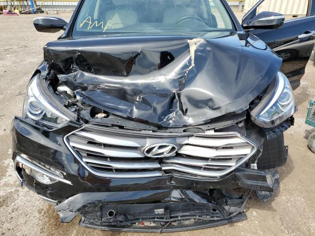 Photo 7 from auction – 2018 HYUNDAI SANTA FE S with VIN 5NMZU3LB2JH098685