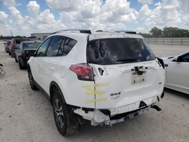 Photo 3 from auction – 2016 TOYOTA RAV4 LE with VIN JTMZFREV1GJ083330