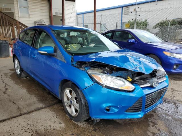 FORD FOCUS SE 2014 with VIN 1FADP3K23EL402409 - Photo from auction