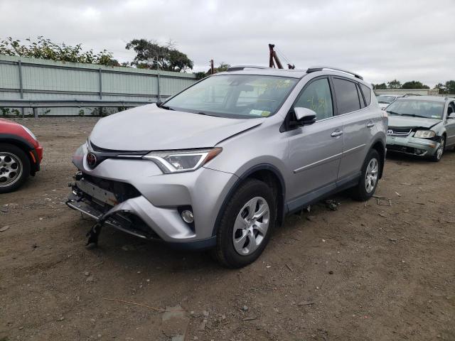 Photo 2 from auction – 2017 TOYOTA RAV4 XLE with VIN 2T3RFREVXHW555768