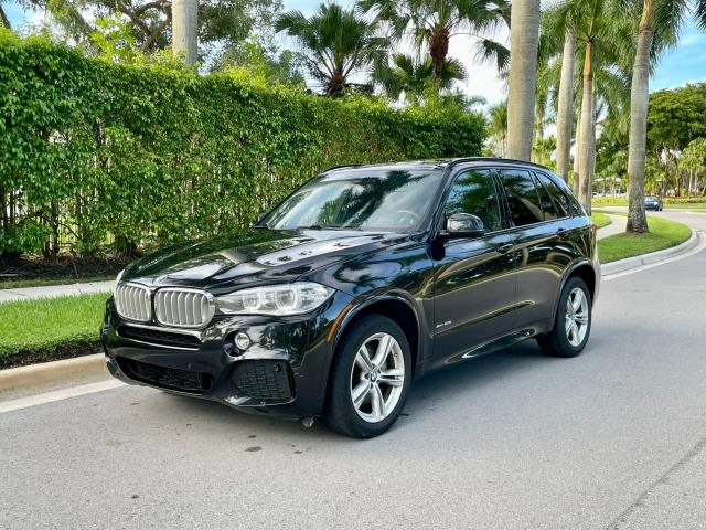 Photo 2 from auction – 2014 BMW X5 XDRIVE5 with VIN 5UXKR6C56E0J72757