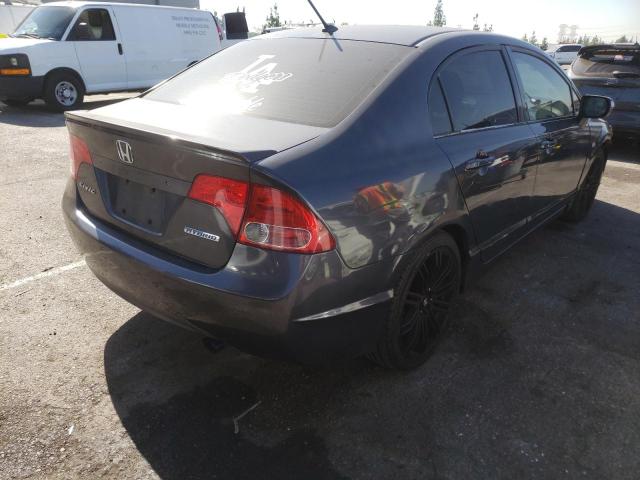 Photo 4 from auction – 2006 HONDA CIVIC HYBR with VIN JHMFA36256S009371